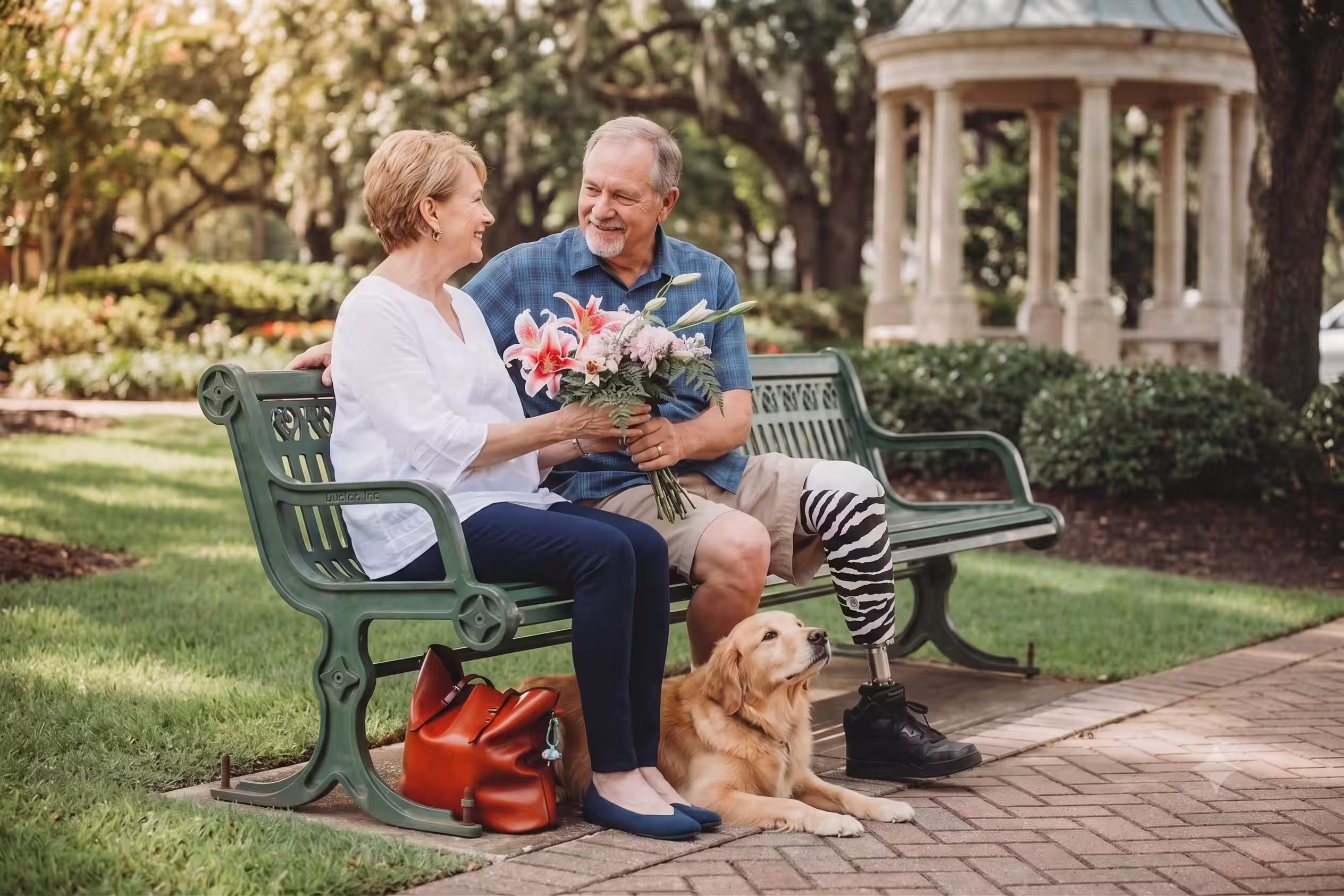 A person with a prosthetic leg enjoying time outdoors with a loved one
